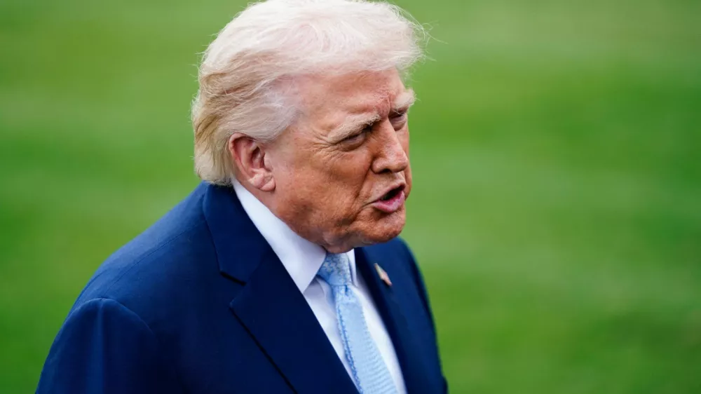 U.S. President Donald Trump speaks to the media as he departs the White House for Florida, in Washington, D.C., U.S., March 20, 2026. REUTERS/Nathan Howard