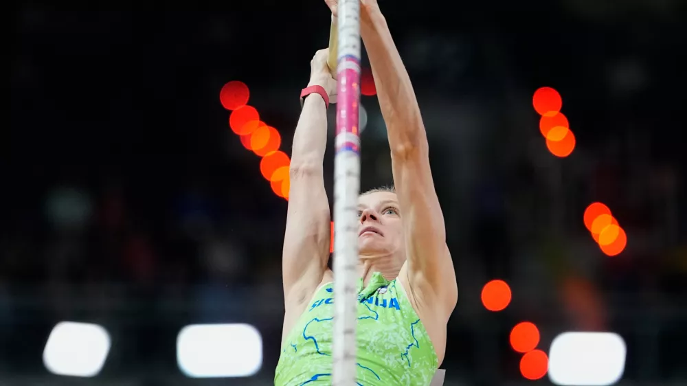 Tina Sutej, of Slovenia, makes an attempt in the women's pole vault final at the World Athletics Indoor Championships in Torun, Poland, Sunday, March 22, 2026. (AP Photo/Matthias Schrader)