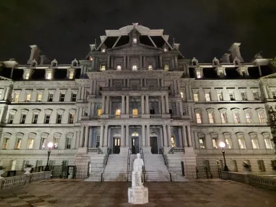 This photo provided by Will Hemsley shows a statue of Christopher Columbus standing in front of the Eisenhower Executive Office Building in Washington, Sunday, March 22, 2026. (Will Hemsley via AP)