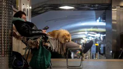 People shelter in a metro station during an air raid warning in Kyiv, amid Russia's attack on Ukraine, March 24, 2026. REUTERS/Thomas Peter    TPX IMAGES OF THE DAY