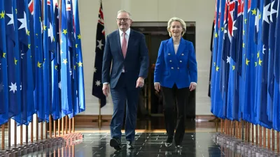 Australian Prime Minister Anthony Albanese and President of the European Commission Ursula von der Leyen walk together after an address to Members and Senators during a joint sitting in the House of Representatives at Parliament House in Canberra, Australia, March 24, 2026. Lukas Coch/AAP/via REUTERS  ATTENTION EDITORS - THIS IMAGE WAS PROVIDED BY A THIRD PARTY. NO RESALES. NO ARCHIVE. AUSTRALIA OUT. NEW ZEALAND OUT. NO COMMERCIAL OR EDITORIAL SALES IN NEW ZEALAND. NO COMMERCIAL OR EDITORIAL SALES IN AUSTRALIA.