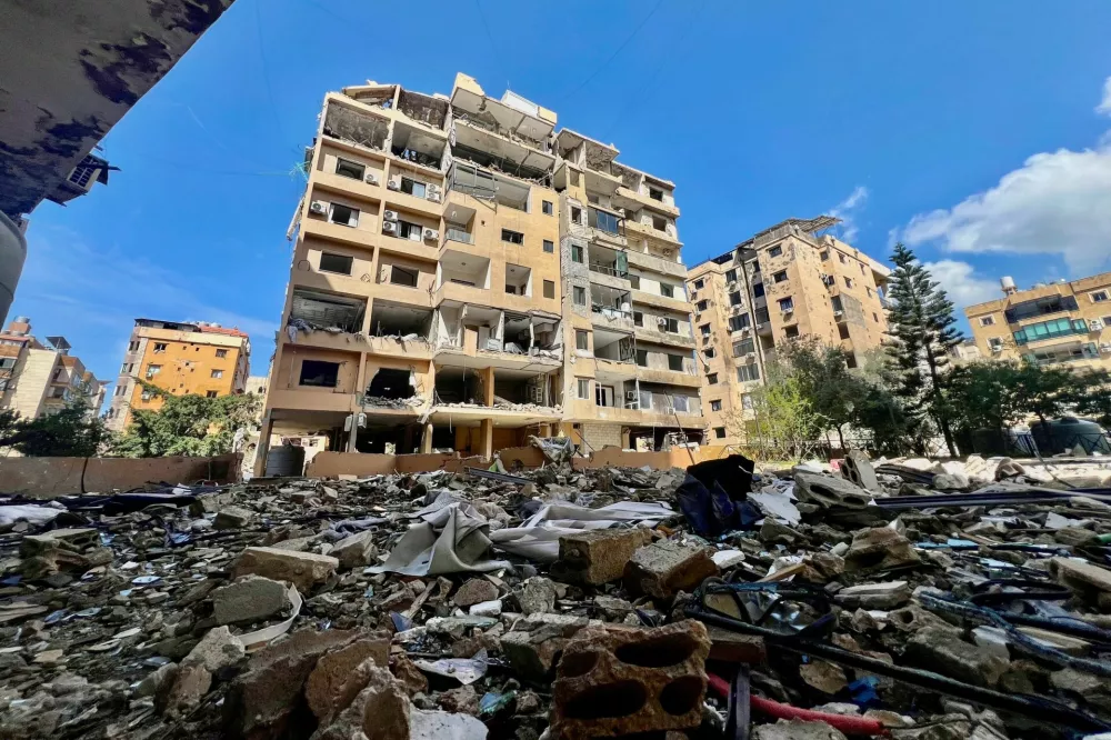 Debris and damaged buildings in the aftermath of overnight Israeli strikes, amid an escalation between Hezbollah and Israel, amid the U.S.-Israeli conflict with Iran, in Beirut's southern suburbs, Lebanon, March 24, 2026. Picture taken with a mobile phone. REUTERS/Stringer