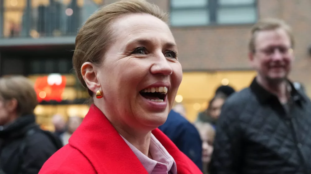 Danish Prime Minister and Leader of the Social Democrats Mette Frederiksen arrives at a rally in her support in Copenhagen, Denmark, on Tuesday, March 24, 2026, during the general election. (AP Photo/Sergei Grits)