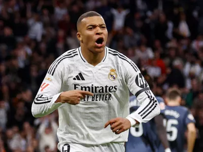 Soccer Football - LaLiga - Real Madrid v Rayo Vallecano - Santiago Bernabeu, Madrid, Spain - March 9, 2025 Real Madrid's Kylian Mbappe celebrates scoring their first goal REUTERS/Susana Vera   TPX IMAGES OF THE DAY