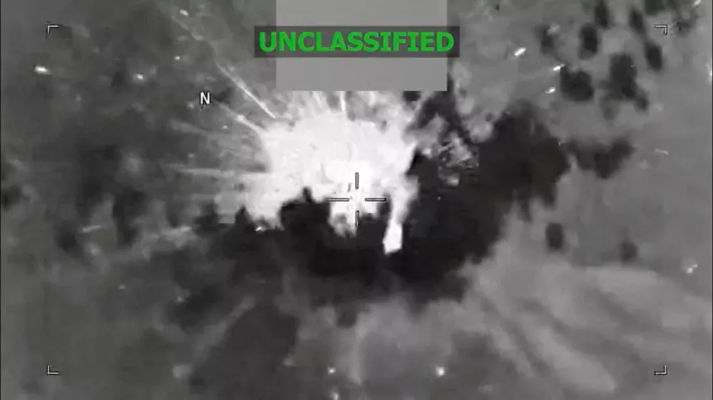 An explosion occurs on a vessel during what the U.S. military says was a kinetic strike on a suspected drug trafficking vessel in the Caribbean, at an unidentified location in this screen grab obtained from a video released on February 13, 2026. US Southern Command/Handout via REUTERS THIS IMAGE HAS BEEN SUPPLIED BY A THIRD PARTY. MANDATORY CREDIT. TEXT OVERLAY AND BLURRING FROM SOURCE.  Verification: Reuters was not able to independently verify the date and location of the footage and identity of the vessel.   TPX IMAGES OF THE DAY