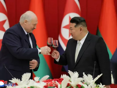 Belarusian President Alexander Lukashenko and North Korea's Kim Jong Un, attend a banquet for Lukashenko in Pyongyang, North Korea, in this picture released by North Korea's official Korean Central News Agency on March 27, 2026. KCNA via REUTERS  ATTENTION EDITORS - THIS IMAGE WAS PROVIDED BY A THIRD PARTY. REUTERS IS UNABLE TO INDEPENDENTLY VERIFY THIS IMAGE. NO THIRD PARTY SALES. SOUTH KOREA OUT. NO COMMERCIAL OR EDITORIAL SALES IN SOUTH KOREA.   TPX IMAGES OF THE DAY