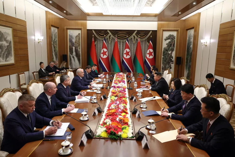 Belarusian President Alexander Lukashenko and North Korean leader Kim Jong Un attend a meeting in Pyongyang, North Korea March 26, 2026. President of the Republic of Belarus/Handout via REUTERS ATTENTION EDITORS - THIS IMAGE WAS PROVIDED BY A THIRD PARTY. MANDATORY CREDIT.