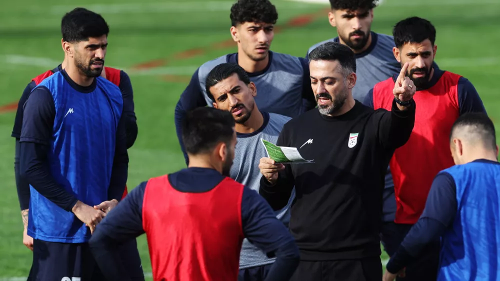 Soccer Football - International Friendly - Iran Training - Huseyin Aygun Football Center, Antalya, Turkey - March 25, 2026 Iran's Hossein Kanaani, Hossein Abraghouei and other teammates with assistant coach Saeed Alhoei during training REUTERS/Umit Bektas