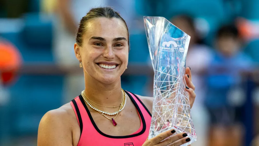 Mar 28, 2026; Miami Gardens, FL, USA; Aryna Sabalenka of Belarus poses with the Butch Buchholz Championship trophy after defeating Coco Gauff of the United States in the final of the women's singles at the Hard Rock Stadium. Mandatory Credit: Mike Frey-Imagn Images   TPX IMAGES OF THE DAY