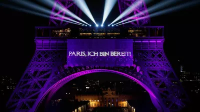 The Eiffel Tower lights up to mark the announcement of concert dates and ticket sales for singer Celine Dion's upcoming ten concerts in September and October in Paris, France, March 30, 2026. REUTERS/Benoit Tessier