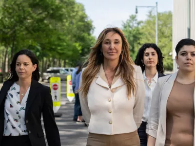FILE - Nicole Daedone, center, founder and former CEO of OneTaste, departs Brooklyn federal court on Tuesday, June 13, 2023 in New York. (AP Photo/Jeenah Moon, File)