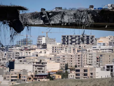 A bridge struck by U.S. airstrikes on Thursday is seen in the town of Karaj, west of Tehran, Iran, Friday, April 3, 2026. (AP Photo/Vahid Salemi)