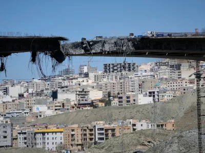 A bridge struck by U.S. airstrikes on Thursday is seen in the town of Karaj, west of Tehran, Iran, Friday, April 3, 2026. (AP Photo/Vahid Salemi)