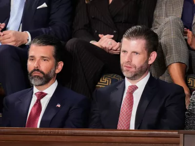 FILE - Donald Trump Jr. and Eric Trump listen to President Donald Trump's State of the Union address at the U.S. Capitol in Washington, Feb. 24, 2026. (AP Photo/Alex Brandon, file)