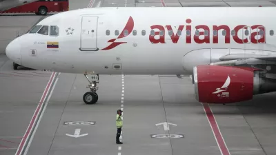 An Avianca plane sit on the tarmac at El Dorado airport in Bogota on November 28, 2025. Colombian airline Avianca reported on Friday "significant" disruptions to its flights due to a required Airbus software update affecting 70 percent of the company's fleet.,Image: 1055260627, License: Rights-managed, Restrictions:, Model Release: no