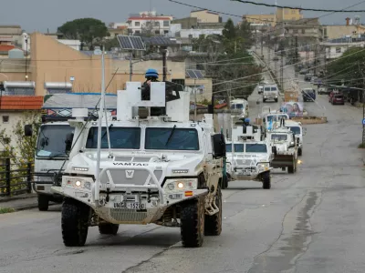 FILE PHOTO: UNIFIL vehicles drive on a main road in Qlayaa, amid escalating hostilities between Israel and Hezbollah, as the U.S.-Israel conflict with Iran continues, in Qlayaa, southern Lebanon, March 27, 2026. REUTERS/Karamallah Daher//File Photo