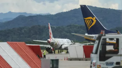 Aircrafts are seen at Milan Bergamo Airport, after flight operations were temporarily suspended when a person died on a runway during take-off preparations, in Orio al Serio, near Bergamo, Italy, July 8, 2025. REUTERS/Claudia Greco