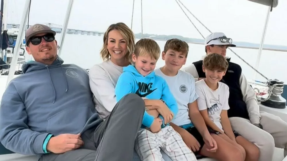 EXCLUSIVE: Story from Jam Press (Boat Life Family)'We sold our expensive house to live on a BOAT with our FOUR kids and cut our bills by 75% after watching YouTube videos&nbsp;of other families doing the same &ndash; people call us insane'A couple have shared how they sold their expensive house to live on a boat with their four kids and save thousands a month.Justin and Jen Wisdom, both 40, took the drastic step after getting fed up with the daily grind.Teacher Justin and interior designer Jen took the plunge by buying a catamaran with their four sons, Liam, 14, Langston, 13, Tavner, 11, and Tenneson, six.Despite being labelled "insane", they haven't looked back and have cut their annual bills by 75%."After almost 20 years in the same city, four kids, multiple jobs, and more moves from suburb to suburb than we can count, Justin came home one day with this wild idea, 'What if we bought a catamaran and sailed the world?'," Jen told creatorzine.com."I honestly thought he'd lost his mind."We had never sailed before, nor did we know a single person who had."But then we started watching YouTube videos of other families doing exactly that, living slower, simpler, more connected lives on the water."Little by little, what felt impossible started to feel intriguing."I could see the spark in Justin, and eventually I felt it in myself too."It was the first time in a long time we were completely on the same page, dreaming the same dream, and actually believing it might be possible."We sold everything, truly everything, except a few clothes, tools, and the essentials we knew would help us transition into boat life."In a strange way, it felt incredibly freeing."Over the years, we had accumulated this huge, mindless collection of stuff without even realising it."Letting it all go felt like hitting a reset button - simplify, start from scratch, breathe again."We loved our home and the little piece of land we had, but we didn't l.31 Mar 2026Pictured: Story from Jam Press (Boat Life Family)Pictured: L-R: Justin, Jen, Tenneson, Langston, Tanner and Liam.'We sold our expensive house to live on a BOAT with our FOUR kids and cut our bills by 75% after watching YouTube videos&nbsp;of other families doing the same &ndash; people call us insane'A couple have shared how they sold their expensive house to live on a boat with their four kids and save thousands a month.Justin and Jen Wisdom, both 40, took the drastic step after getting fed up with the daily grind.Teacher Justin and interior designer Jen took the plunge by buying a catamaran with their four sons, Liam, 14, Langston, 13, Tavner, 11, and Tenneson, six.Despite being labelled "insane", they haven't looked back and have cut their annual bills by 75%."After almost 20 years in the same city, four kids, multiple jobs, and more moves from suburb to suburb than we can count, Justin came home one day with this wild idea, 'What if we bought a catamaran and sailed the world?'," Jen told.,Image: 1087721729, License: Rights-managed, Restrictions: NO Australia, Germany, Norway, South Korea, Sweden, United Kingdom, United States, Unknown Country, Model Release: no, Pictured: Video grab: The Wisdom family
