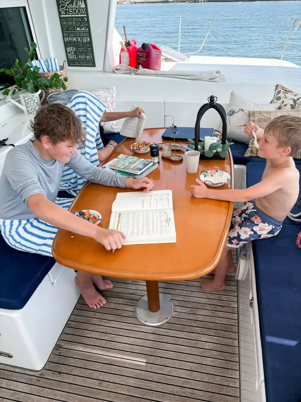 EXCLUSIVE: Story from Jam Press (Boat Life Family)'We sold our expensive house to live on a BOAT with our FOUR kids and cut our bills by 75% after watching YouTube videos&nbsp;of other families doing the same &ndash; people call us insane'A couple have shared how they sold their expensive house to live on a boat with their four kids and save thousands a month.Justin and Jen Wisdom, both 40, took the drastic step after getting fed up with the daily grind.Teacher Justin and interior designer Jen took the plunge by buying a catamaran with their four sons, Liam, 14, Langston, 13, Tavner, 11, and Tenneson, six.Despite being labelled "insane", they haven't looked back and have cut their annual bills by 75%."After almost 20 years in the same city, four kids, multiple jobs, and more moves from suburb to suburb than we can count, Justin came home one day with this wild idea, 'What if we bought a catamaran and sailed the world?'," Jen told creatorzine.com."I honestly thought he'd lost his mind."We had never sailed before, nor did we know a single person who had."But then we started watching YouTube videos of other families doing exactly that, living slower, simpler, more connected lives on the water."Little by little, what felt impossible started to feel intriguing."I could see the spark in Justin, and eventually I felt it in myself too."It was the first time in a long time we were completely on the same page, dreaming the same dream, and actually believing it might be possible."We sold everything, truly everything, except a few clothes, tools, and the essentials we knew would help us transition into boat life."In a strange way, it felt incredibly freeing."Over the years, we had accumulated this huge, mindless collection of stuff without even realising it."Letting it all go felt like hitting a reset button - simplify, start from scratch, breathe again."We loved our home and the little piece of land we had, but we didn't l.31 Mar 2026Pictured: Story from Jam Press (Boat Life Family)Pictured: Langston, Tavner and Tenneson.'We sold our expensive house to live on a BOAT with our FOUR kids and cut our bills by 75% after watching YouTube videos&nbsp;of other families doing the same &ndash; people call us insane'A couple have shared how they sold their expensive house to live on a boat with their four kids and save thousands a month.Justin and Jen Wisdom, both 40, took the drastic step after getting fed up with the daily grind.Teacher Justin and interior designer Jen took the plunge by buying a catamaran with their four sons, Liam, 14, Langston, 13, Tavner, 11, and Tenneson, six.Despite being labelled "insane", they haven't looked back and have cut their annual bills by 75%."After almost 20 years in the same city, four kids, multiple jobs, and more moves from suburb to suburb than we can count, Justin came home one day with this wild idea, 'What if we bought a catamaran and sailed the world?'," Jen told creatorzine.com."I hon.,Image: 1087721786, License: Rights-managed, Restrictions: NO Australia, Germany, Norway, South Korea, Sweden, United Kingdom, United States, Unknown Country, Model Release: no, Pictured: Video grab: The Wisdom family