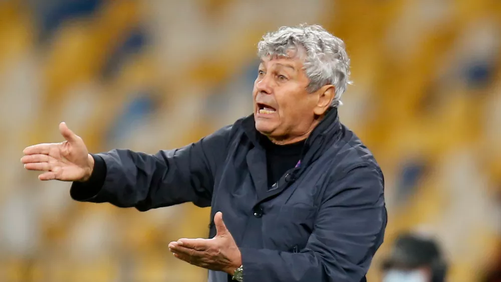 FILE - Dynamo Kiev's head coach Mircea Lucescu gives instructions during the Champions League Play-offs, 2nd leg soccer match between Gent and Dynamo Kyiv in Kyiv, Ukraine, Tuesday, Sept. 29, 2020. (AP Photo/Efrem Lukatsky, File)