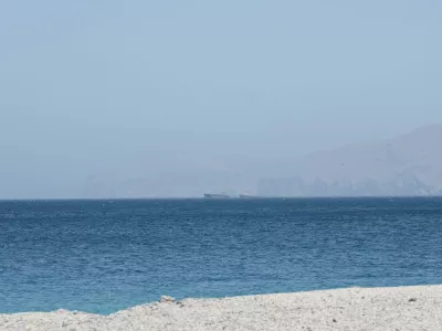 Vessels are off the coast of Musandam governorate, overlooking the strait of Hormuz, in Musandam governance, in Oman, April 8, 2026.REUTERS/Stringer