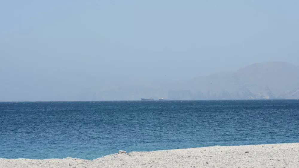 Vessels are off the coast of Musandam governorate, overlooking the strait of Hormuz, in Musandam governance, in Oman, April 8, 2026.REUTERS/Stringer