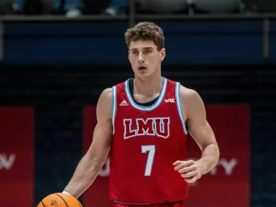 2S2YP3H Moraga CA, U.S.A. January 07 2025 Loyola guard Jan Vide (7)brings the ball up court during the NCAA Mens Basketball game between Loyola Marymount Lions and the Saint Marys Gaels. Saint Marys beat Loyola Marymount 81-56 at University Credit Union Pavilion Moraga Calif. Thurman James/CSM