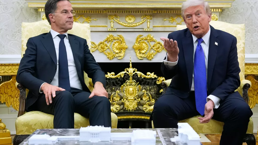 FILE - President Donald Trump meets with NATO Secretary General Mark Rutte in the Oval Office of the White House, Oct. 22, 2025, in Washington. (AP Photo/Alex Brandon, File)