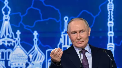 Russian President Vladimir Putin gestures during the annual congress of the Russian Union of Industrialists and Entrepreneurs in Moscow, Russia, Thursday, March 26, 2026. (Yury Kochetkov, Sputnik, Kremlin Pool Photo via AP)
