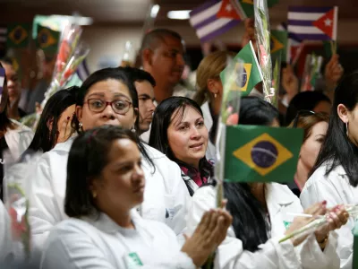 Cuban doctors take part in a welcoming ceremony at the Jose Marti International Airport after arriving from Brazil, in Havana, Cuba, November 23, 2018. REUTERS/Fernando Medina