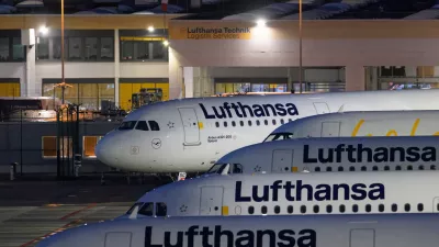 Lufthansa aircraft are parked at Frankfurt Airport, in Frankfurt, Germany, Friday, April 10, 2026, as the cabin crew of Lufthansa and its subsidiary Lufthansa Cityline to go on strike. (Hannes P. Albert/dpa via AP)