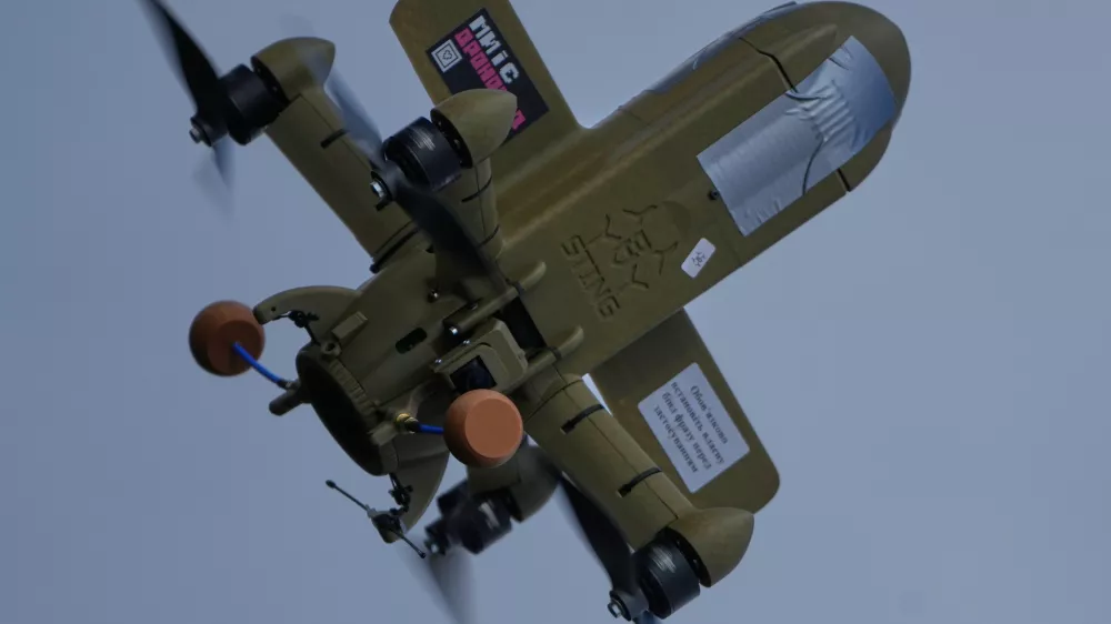 FILE - A Sting interceptor drone flies during drills at the Yatagan School for Unmanned Aerial Systems in the Kyiv region, Ukraine, on March 19, 2026. (AP Photo/Efrem Lukatsky, File)