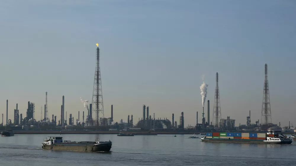 Boats past a TotalEnergies refining and petrochemicals platform in the port of Antwerp, Belgium April 9, 2026. REUTERS/Yves Herman