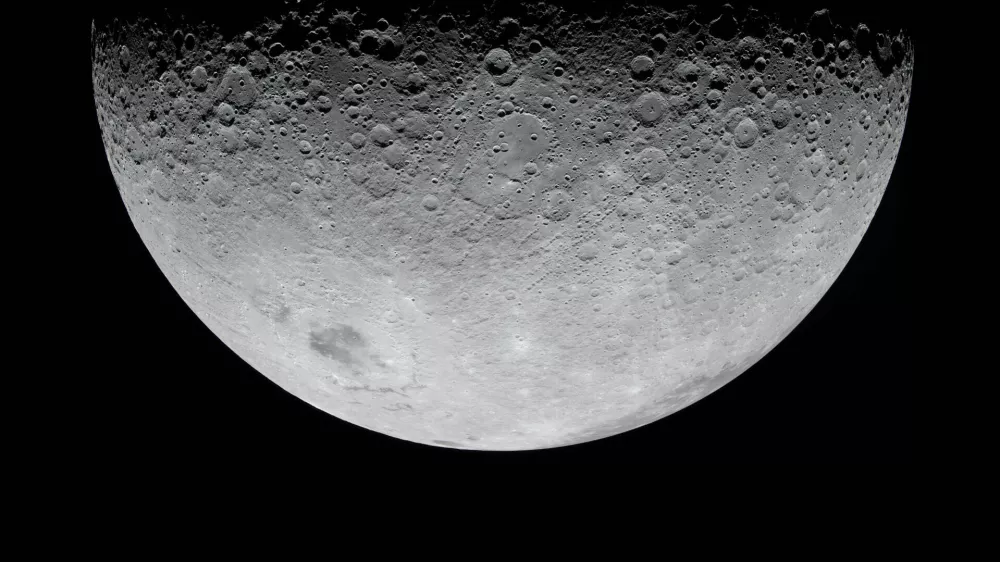 In this image provided by NASA, the Artemis II crew photographed the Moon's crater on Monday, April 6, 2026. (NASA via AP)