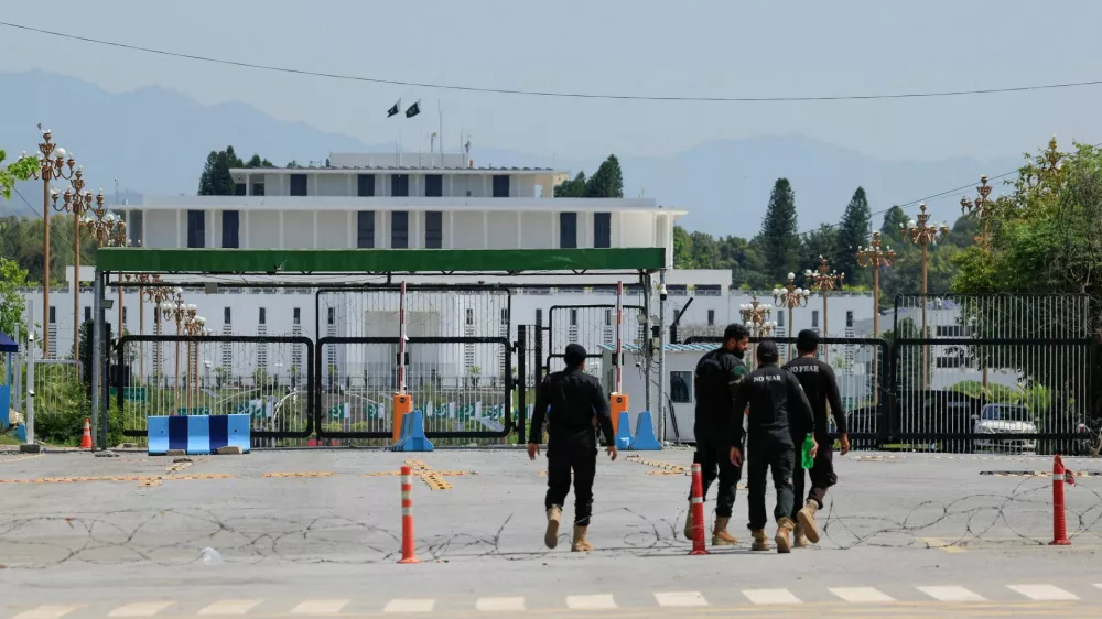 Police officers walk towards the President house, as Pakistan prepares to host the U.S. and Iran for peace talks, in Islamabad, Pakistan, April 10, 2026. REUTERS/Akhtar Soomro