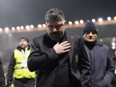 Italy's coach Gennaro Gattuso walks off the pitch after losing in a World Cup qualifying playoff final soccer match between Bosnia and Italy in Zenica, Bosnia, Tuesday, March 31, 2026. (Fabio Ferrari/LaPresse via AP)