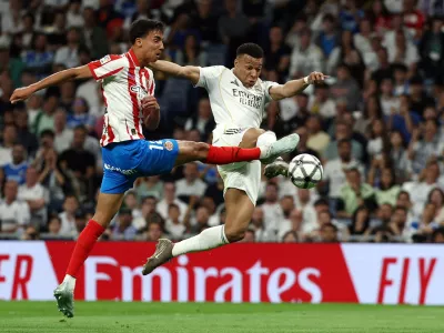 Soccer Football - LaLiga - Real Madrid v Girona - Santiago Bernabeu, Madrid, Spain - April 10, 2026 Girona's Vitor Reis in action with Real Madrid's Kylian Mbappe REUTERS/Gonzalo Fuentes   TPX IMAGES OF THE DAY