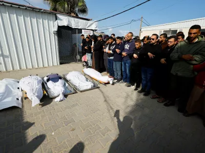 Mourners pray during the funeral of Palestinians who were killed in an Israeli strike, according to medics, at Al-Aqsa Martyrs Hospital in Deir al-Balah, central Gaza Strip, April 11, 2026. REUTERS/Mahmoud Issa