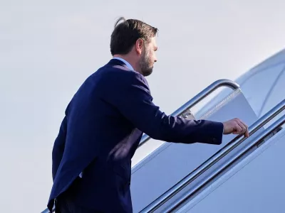 U.S. Vice President JD Vance boards Air Force Two for expected departure to Pakistan for talks on Iran, at Joint Base Andrews, Maryland, U.S., April 10, 2026. Jacquelyn Martin/Pool via REUTERS