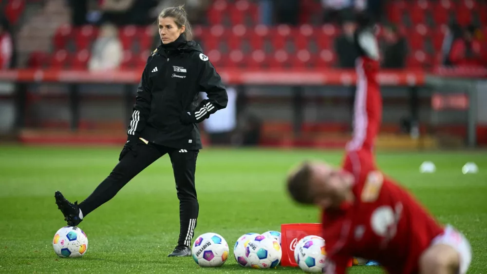 FILE PHOTO: Soccer Football - Bundesliga - 1. FC Union Berlin v FC Augsburg - Stadion An der Alten Forsterei, Berlin, Germany - November 25, 2023 1. FC Union Berlin assistant coach Marie-Louise Eta during the warm up before the match REUTERS/Annegret Hilse /File Photo NO RESALES. NO ARCHIVES