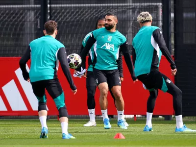 Soccer Football - UEFA Champions League - Liverpool Training - AXA Training Centre, Liverpool, Britain - April 13, 2026 Liverpool's Mohamed Salah with Hugo Ekitike, Florian Wirtz and Rio Ngumoha during training REUTERS/Ed Sykes