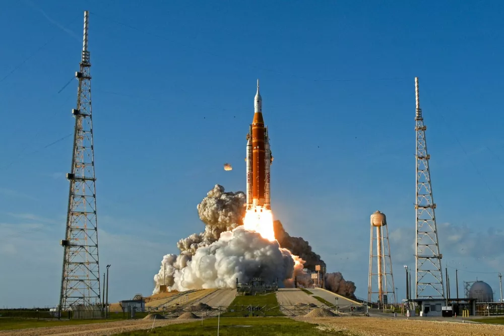 FILE PHOTO: NASA's Artemis II mission to fly by the moon, comprising of the Space Launch System (SLS) rocket with the Orion crew capsule, lifts off from the Kennedy Space Center in Cape Canaveral, Florida, U.S. April 1, 2026. REUTERS/Steve Nesius/File Photo