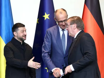 German Chancellor Friedrich Merz, Ukrainian President Volodymyr Zelenskiy, and German Defence Minister Boris Pistorius attend a signing ceremony during the German-Ukrainian government consultations, at the Chancellery in Berlin, Germany, April 14, 2026. REUTERS/Liesa Johannssen
