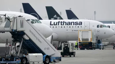 Lufthansa aircraft are parked at an airport as Lufthansa pilots are on a two-day strike in Munich, Germany, Monday, April 13, 2026. (AP Photo/Matthias Schrader)