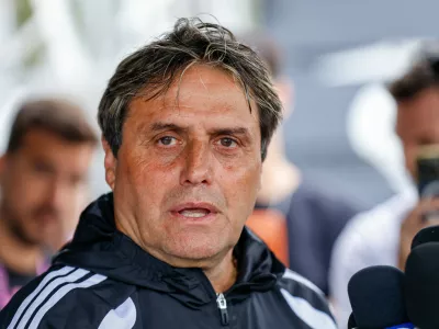 Inter Miami head coach Guillermo Hoyos responds to a question during a media availability at the MLS soccer team's training facility, Wednesday, April 15, 2026, in Fort Lauderdale, Fla. (AP Photo/Chris Arjoon)