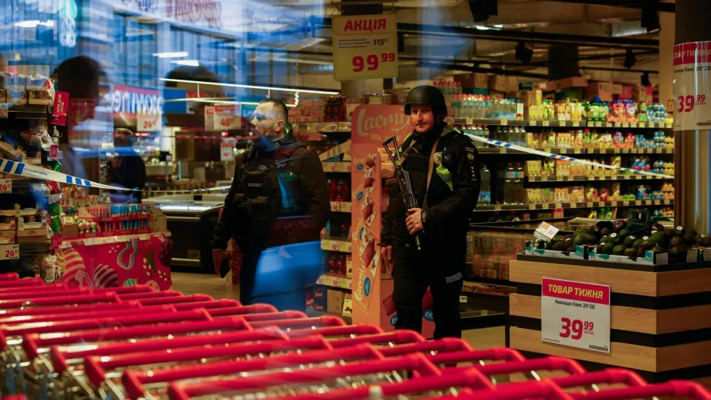 Armed police stand inside a supermarket, where Ukrainian police killed a man who opened fire in a city district and barricaded himself into the supermarket on Saturday, Ukrainian Interior Minister Ihor Klymenko said, in Kyiv, Ukraine, April 18, 2026. REUTERS/Valentyn Ogirenko