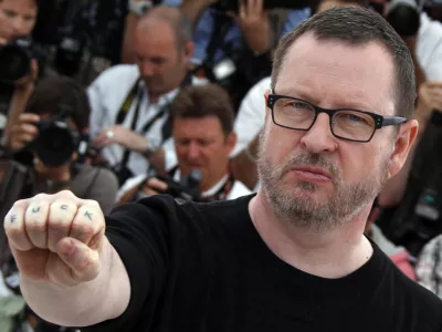 Director Lars Von Trier poses during a photocall for the film "Melancholia", in competition at the 64th Cannes Film Festival, May 18, 2011. Von Trier was expelled from the Cannes film festival on Thursday after remarks he made at a news conference, apparently in jest, in which he declared himself a Nazi and Hitler sympathiser. Picture taken May 18, 2011. REUTERS/Eric Gaillard (FRANCE - Tags: ENTERTAINMENT) TEMPLATE OUT. SENSITIVE MATERIAL. THIS IMAGE MAY OFFEND OR DISTURB