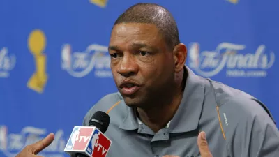 Boston Celtics coach Doc Rivers speaks during a news conference at the 2010 NBA Finals basketball series in Boston, Massachusetts June 12, 2010. The 2010 NBA Finals resumes June 13 when the Celtics and Los Angeles Lakers meet in Game 5 in Boston. REUTERS/Adam Hunger (UNITED STATES - Tags: SPORT BASKETBALL)