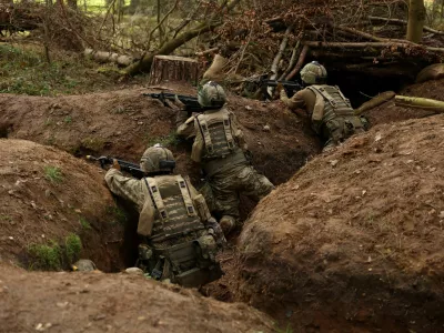 Ukrainian soldiers take part in a final tactical exercise on the fourth anniversary of Russia's full-scale invasion of Ukraine, held at a British Army training camp in East Anglia, Britain, February 24, 2026. REUTERS/Chris Radburn