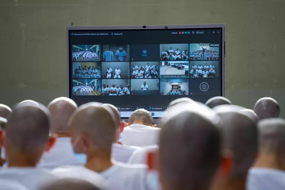 Members of Mara Salvatrucha, also known as MS-13 gang, attend an open hearing by El Salvador prosecutors against 486 members of the gang, who are accused of more than 47,000 crimes committed between 2012 and 2022, according to a statement from the Attorney General's Office, at the Terrorism Confinement Center (CECOT) in Tecoluca, El Salvador, April 20, 2026. Attorney General's Office of El Salvador/Handout via REUTERS ATTENTION EDITORS - THIS IMAGE HAS BEEN SUPPLIED BY A THIRD PARTY. NO RESALES. NO ARCHIVES.